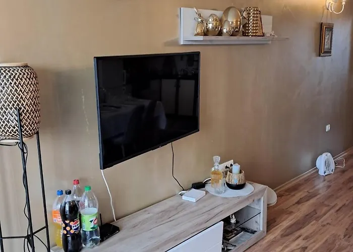 In Апартамент